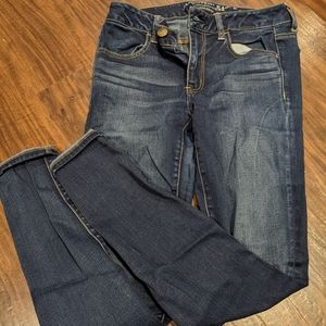 Dark wash mid rise skinny jeans